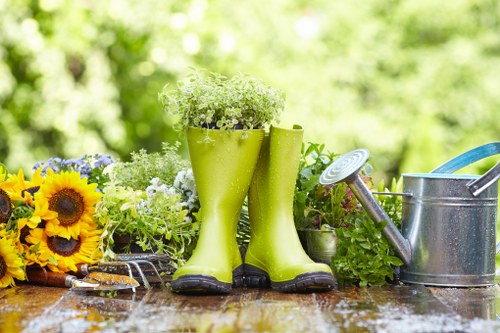 Insured and well-prepared gardeners working in Teddington
